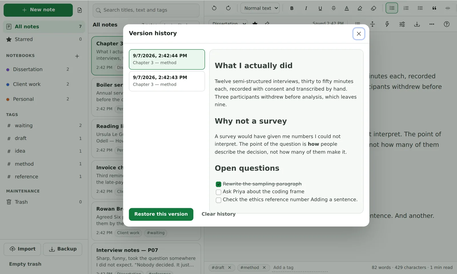 The Version history dialogue: a list of saved versions on the left with their timestamps, and the selected version rendered in full on the right, with Restore this version and Clear history beneath.